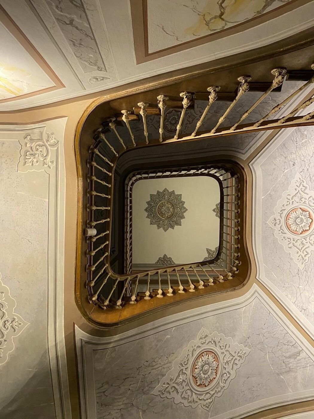 Ornate spiral staircase representing turnkey craftsmanship
